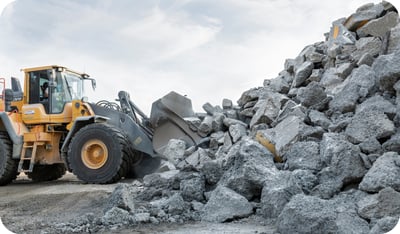 Front loader at recycling site for sustainable concrete materials management